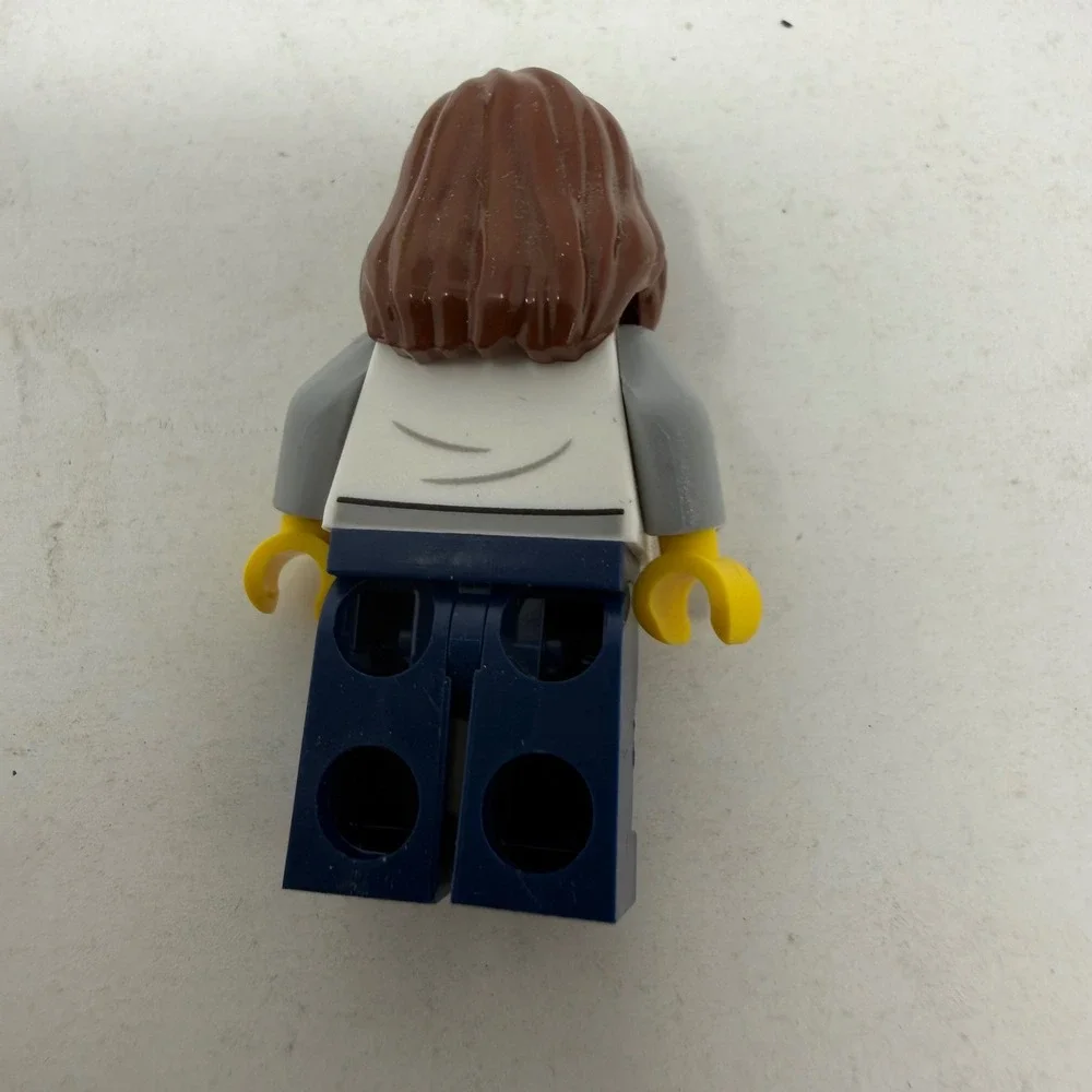 LEGO Minifigure Female Mountain Paint Splatter Shirt Brown Wavy Hair Blue Legs